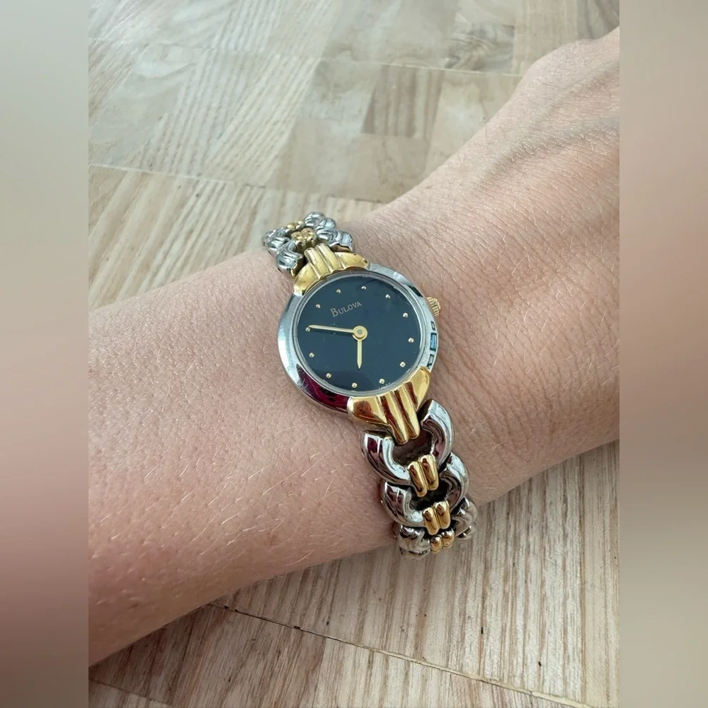 Bulova ladies black dial two toned dress watch NEW BATTERY